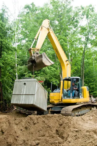 Excavation work for drainage and foundation on a residential property